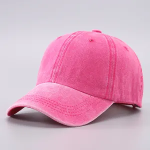 Close-up of vintage washed cotton baseball cap with six-panel crown and stitched brim