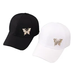 Black and white breathable baseball caps featuring a decorative golden butterfly design