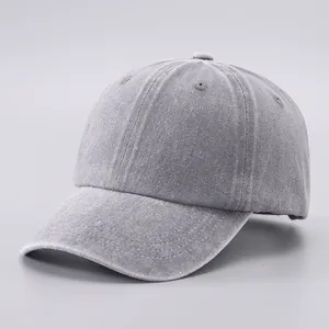 Detailed macro view showing the washed cotton fabric texture and eyelets of the baseball cap