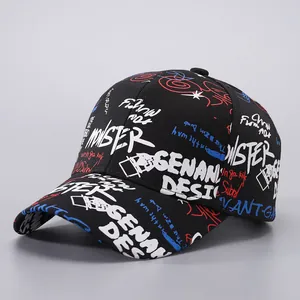Close-up of black cotton baseball cap featuring colorful graffiti and artistic text prints