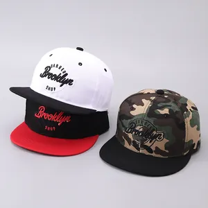 Detailed close-up of hip hop snapback hats with BARBER Brooklyn SHOP 3D embroidery