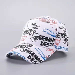 Detailed view of white canvas baseball cap with black and red graffiti letters and patterns