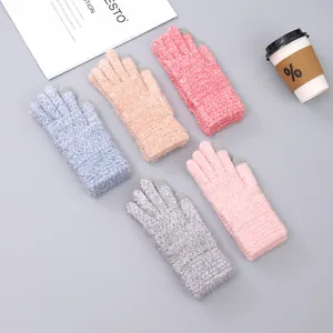 Close-up of colorful touchscreen knit gloves with ribbed cuffs in a flat lay setup