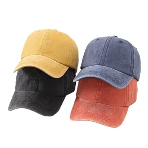 Washed cotton baseball caps in yellow, navy, black and red with a distressed vintage look