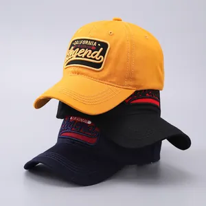 Close-up of vintage cotton baseball caps with high-quality 3D letter embroidery and curved brim