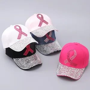 Detailed view of four baseball caps featuring rhinestone ribbons and fully crystal-set brims