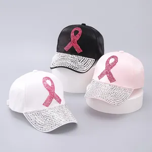 Detailed close-up of three satin baseball caps with rhinestone ribbon and brim crystals