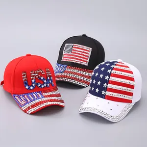 Detail view of sparkling rhinestones on USA flag baseball caps in red, black, and white