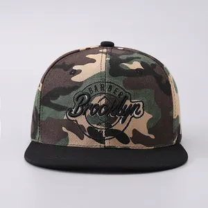 Front detail of camouflage snapback hat with Brooklyn 3D embroidery and black flat brim