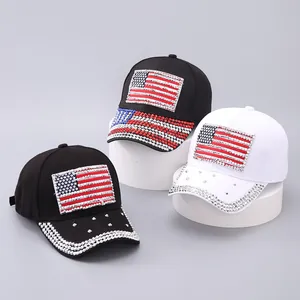 Detailed view of USA flag patterns made of rhinestones on black and white baseball caps