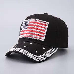 Close-up of USA flag rhinestone patch and sparkling crystals on black baseball cap brim