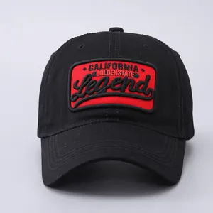 Close-up of California Legend embroidery and stitching on the black cotton baseball cap