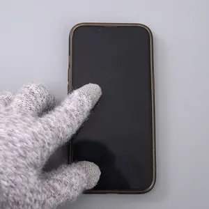 Thick grey knit winter gloves with touchscreen compatibility and warm plush lining