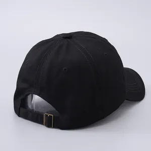 Detail view of cotton baseball cap back with vintage metal buckle and adjustable strap