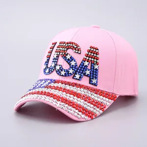 Pink baseball cap with USA rhinestone letters and glittering American flag stars