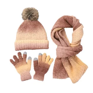 Three-piece winter tie-dye knit set with pom-pom hat, scarf, and touchscreen gloves