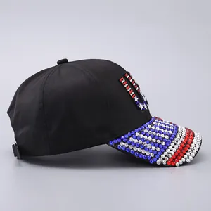 Detail of USA American flag motif with red white and blue rhinestones on black baseball cap