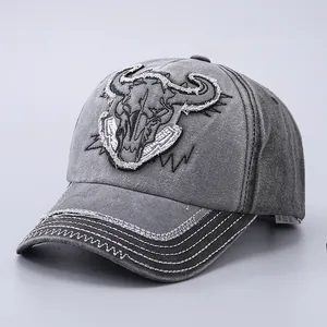 Vintage washed grey cotton baseball cap featuring bull skull embroidery and retro stitching