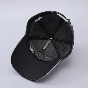 Detail of internal wash label showing 80% cotton material on washed denim baseball cap
