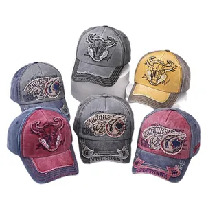 Vintage washed cotton baseball caps with animal embroidery and distressed brim details