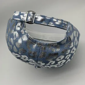 Blue baseball cap with silver leopard print and adjustable metal back strap detail