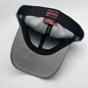 Detail view of grey baseball cap interior showing black sweatband and size label