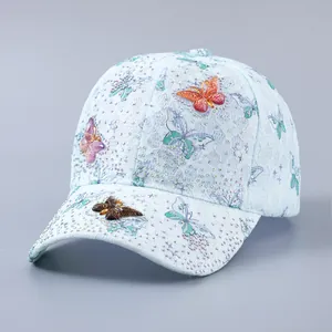 Light blue lace baseball cap with sparkling rhinestones and 3D butterfly decorations