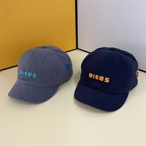 Short brim baseball caps with BIEBS embroidery in grey-blue and navy cotton twill