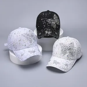 Lace baseball caps in black and white with sparkling rhinestone butterfly design