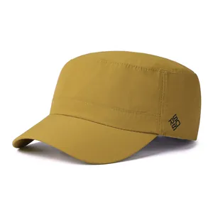 Detail of mustard yellow quick-dry army cap with grid texture and side geometric logo