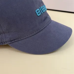 Short brim baseball cap in blue-grey cotton with BIEBE 3D embroidery and top stitching