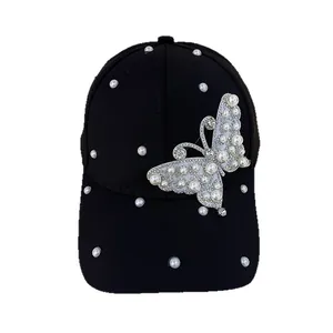 Women's black cotton baseball cap with pearls, rhinestones and a large butterfly