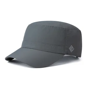 Detailed view of quick-dry fabric texture and silver US RUN logo on dark grey flat top cap