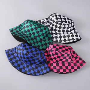 Detailed flat lay of checkered bucket hats featuring smiley face prints in four colors