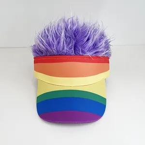 Detailed view of rainbow striped sun visor hat with creative purple wig hair on top