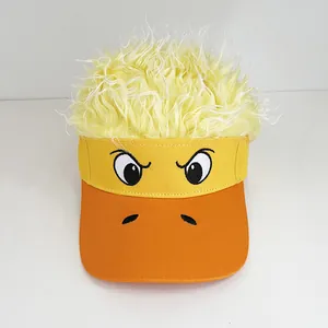 Detail of embroidered cartoon face on baseball cap with fluffy yellow wig top