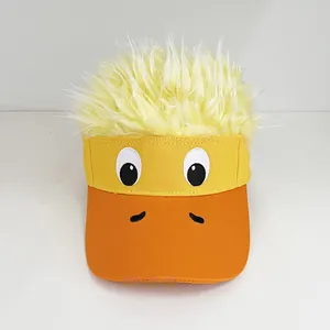Detail of creative yellow duck sun visor with plush faux hair and embroidered eyes