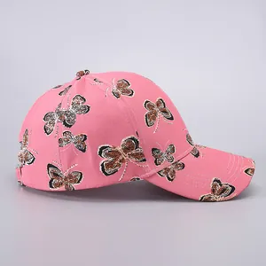 Pink baseball cap with leopard print butterfly pattern and adjustable metal buckle