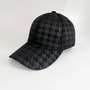 Classic houndstooth baseball cap for women with curved brim and black plaid pattern
