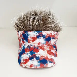 Detail of red white and blue visor hat featuring attached brown synthetic wig hair