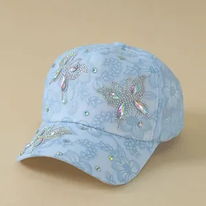 Light blue floral lace baseball cap with rhinestone butterfly and sparkling crystal brim
