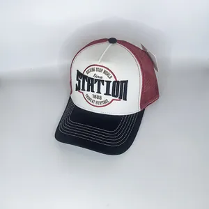 Detail der Vintage Mesh Trucker Kappe mit Stickerei und Kontrastfarben-Design