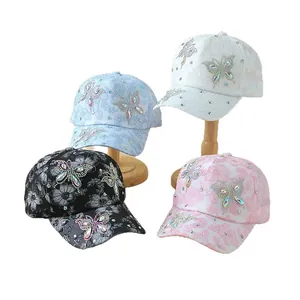 Elegant lace flower baseball caps with rhinestone butterfly in white, blue, black, and pink