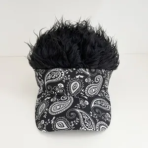 Detail of wig visor hat with black synthetic hair and paisley print sun visor brim