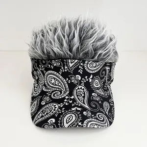 Detail of creative visor with grey synthetic wig and white paisley pattern brim