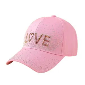 Pink baseball cap for women with rhinestone LOVE lettering and full crystal embellishments