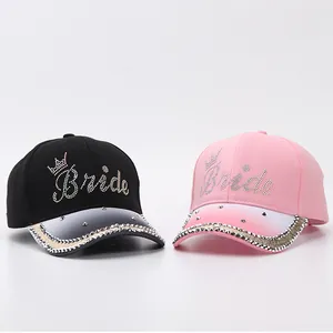 Detail of rhinestone Bride lettering and crown on gradient-brim baseball caps