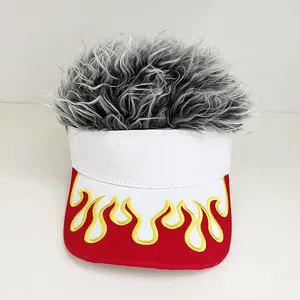 Detail of red flame embroidery on white baseball cap with grey synthetic wig hair