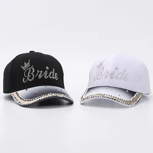 Set of black and white baseball caps with rhinestone Bride lettering and crown