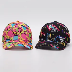 Detail view of retro 80s-90s pop style printed baseball caps with geometric patterns